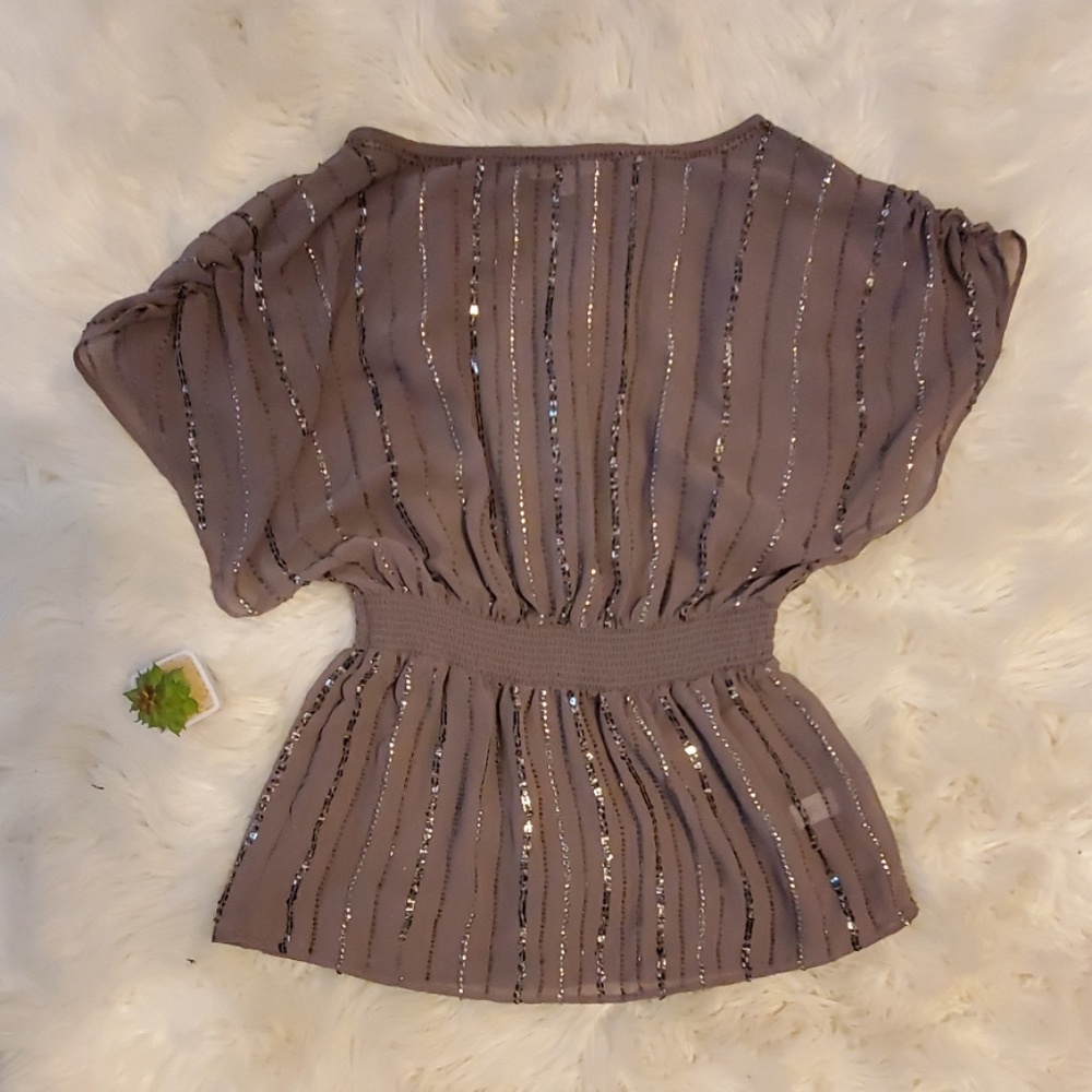 Jennifer Lopez sequin blouse